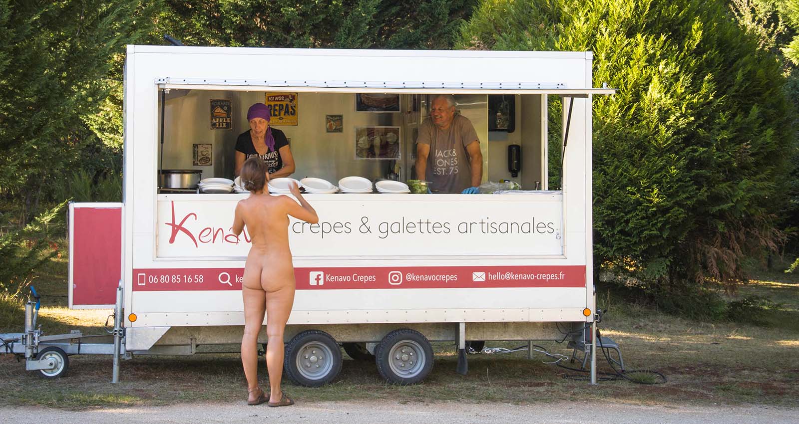 Why are the staff of the naturist resort not naked?